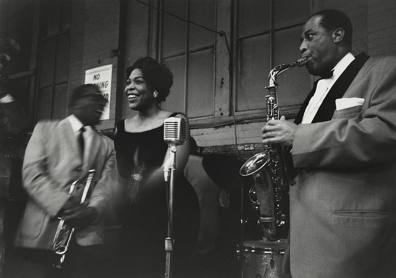 Paul J. Hoeffler, Saturday Night Dance with the Erskine Hawkins Band, 1958
Gelatin silver print; printed later, 11 x 14 in. (27.9 x 35.6 cm)
Erskine Hawkins (1914-1993) was a trumpeter and big-band leader, most remembered for composing "Tuxedo Junction". Here is another atmospheric Hoeffler image capturing the feel of a jazz-dance. Signed by the photographer.
7376
Sold