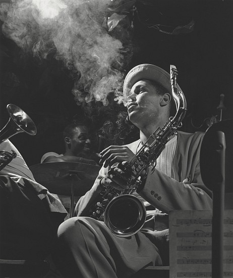Herman Leonard, Dexter Gordon, Royal Roost, NYC, 1948
Gelatin silver print; printed later, 12 x 10 in. (30.5 x 25.4 cm)
One of the most famous portraits in jazz. Dexter Gordon (1923-1990), a tenor saxophonist, was one of the first bebop tenors, ranked with musicians such as Charlie Parker, Dizzy Gillespie, and Bud Powell. Known as "Long Tall Dexter", his career spanned over 40 years. Signed by the photographer. Framed.
7406
Sold