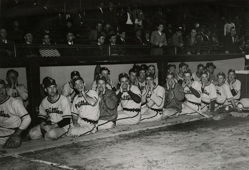 William C. Greene, Phillies dugout taunting Robinson, c. April 22, 1947
Vintage gelatin silver print, 6 7/16 x 9 5/8 in. (16.4 x 24.4 cm)
Dated 1947 and "(yelling at Jackie Robinson)" in ink and stamped "PHOTO BY/ WM. C. GREENE" with Sporting News Collection authentication label and "41" label and numbered "pau461" in pencil on print verso.
8479