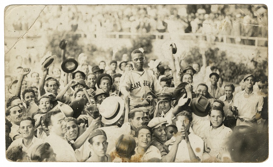 Unidentified photographer, Roy Partlow after defeating Satchel Paige, San Juan, December 23, 1939
Vintage gelatin silver print, 3 1/8 x 5 1/4 in. (7.9 x 13.3 cm)
Printed on postcard stock.
8477