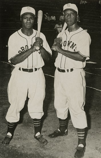 George Dorrill, Willard Brown and Hank Thompson, 1947
Vintage gelatin silver print, 5 3/8 x 3 1/2 in. (13.7 x 8.9 cm)
Titled "Hank Thompson + Willard Brown" in ink with "St. Louis Browns/Negro Stars" in pencil and photographer's label affixed with Page# 28 Key# 5/Job No. 8625/Camera Setting 5/5 with numbers written in ink.
Illustrated: The Sporting News, July 30, 1947.
8551